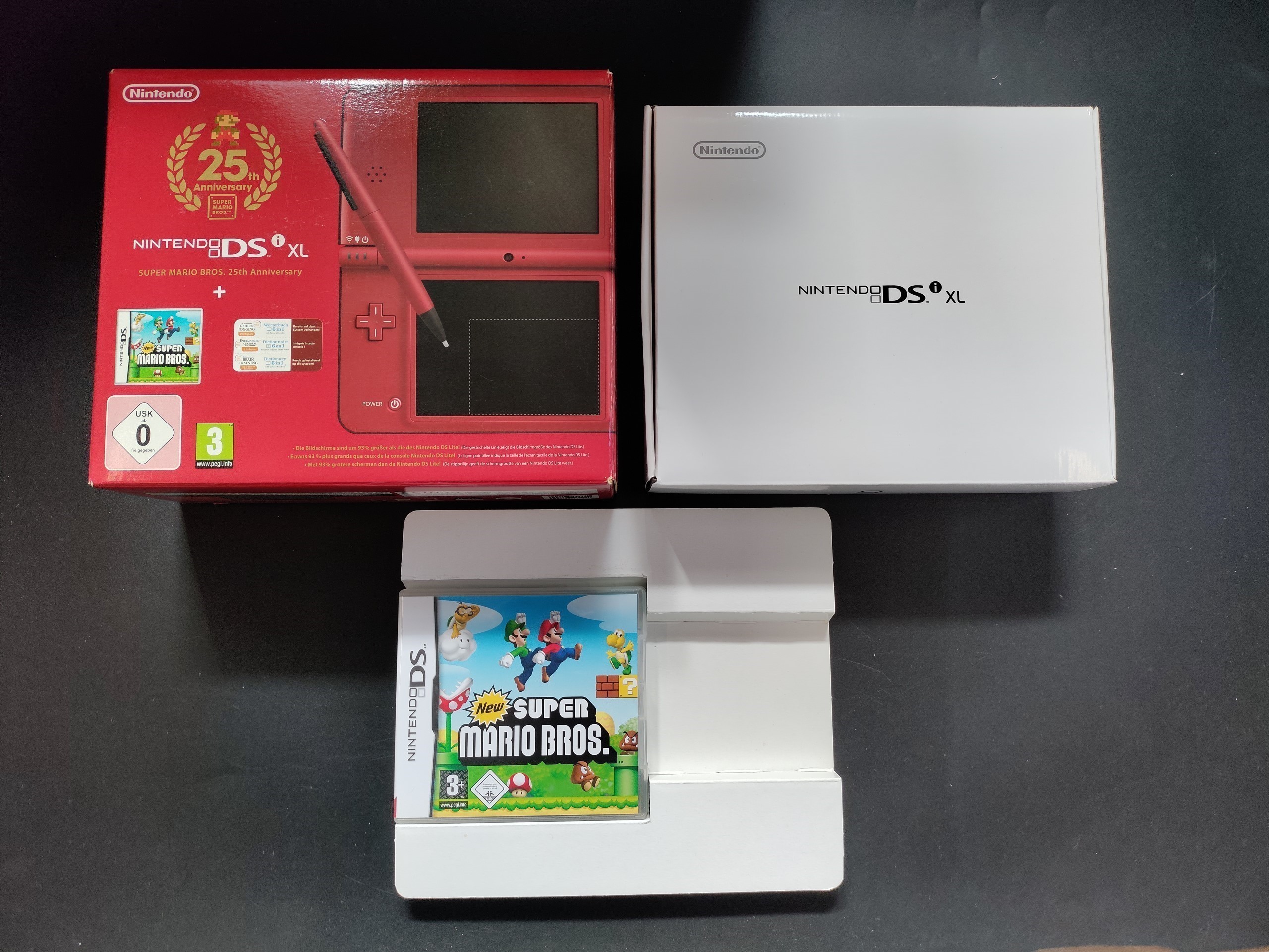 Restored Nintendo DSi XL Super Mario Red